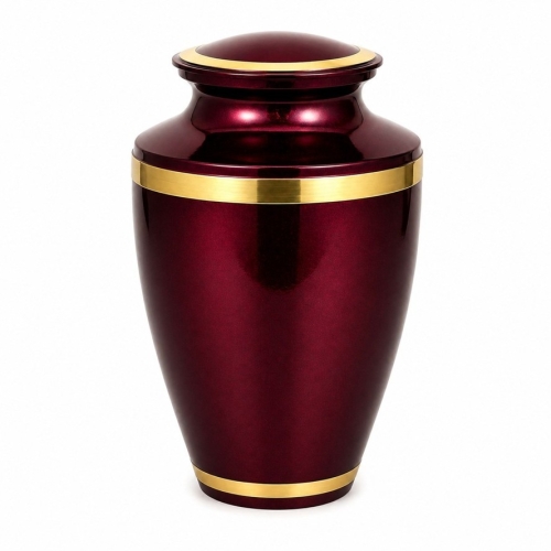 Bordeauxrode urn met goudaccenten