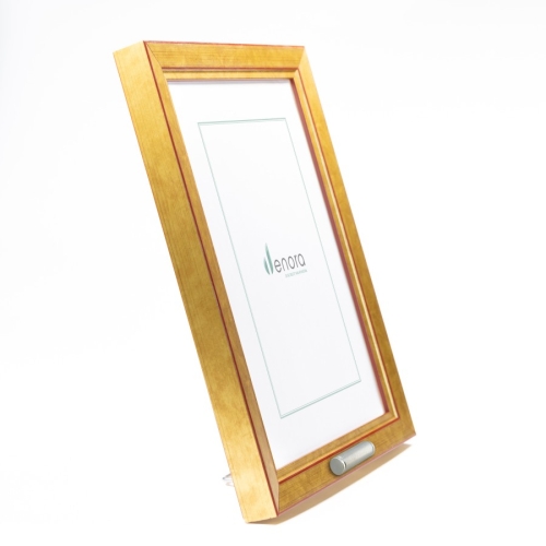 Fotokader met gouden finish en klein asbuisje