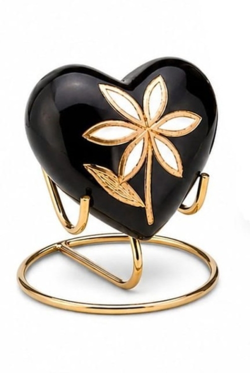 Zwarte urn met gouden bloem